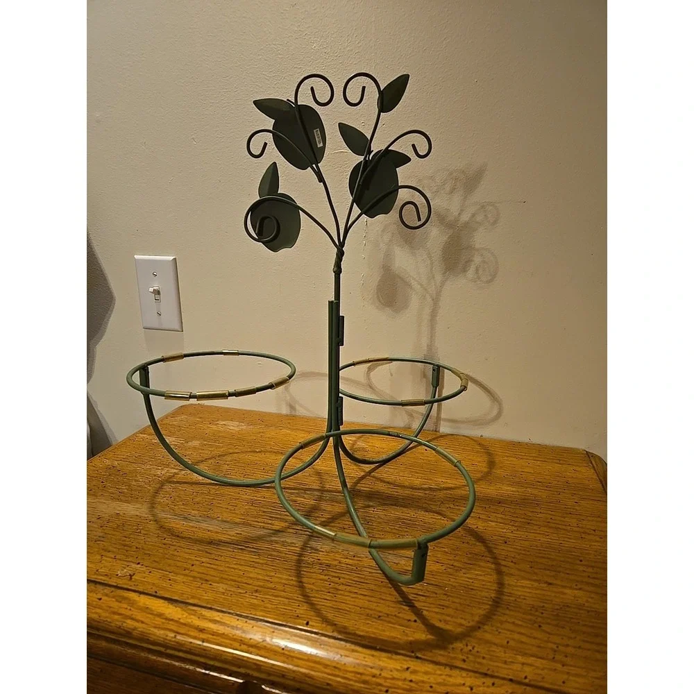 vintage-style wrought iron apple tree display stand